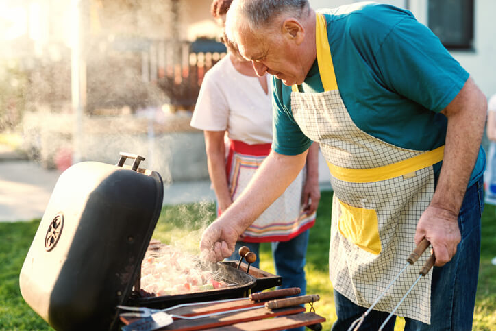 Man Fires Up The Grill