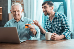 Young Man taking money from Father