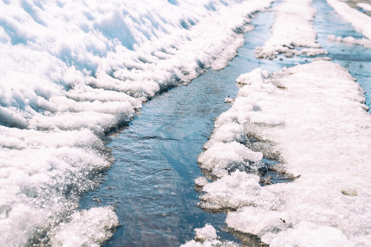 Snow melting in spring