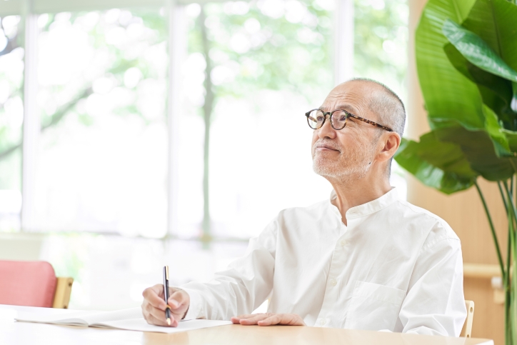 man writing personal values