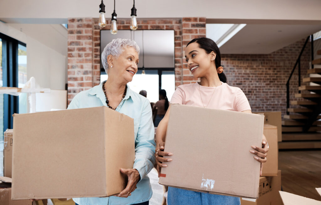 daughter helping her mother move